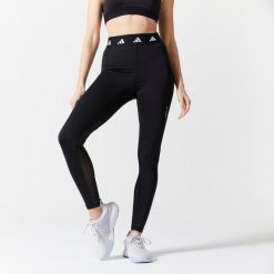 Legginsy fitness damskie Adidas. Legginsy adidas, bez wzorów, z materiału, sportowe. Za 119.99 zł.