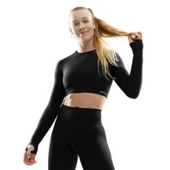 Damska bezszwowa sportowa koszulka crop top z długim rękawem Fitness Siroko Te. Czarne topy sportowe SIROKO, l, bez wzorów, z materiału, do biegania. W wyprzedaży za 105.00 zł.
