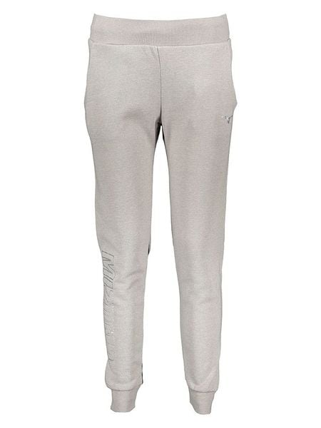 Mizuno Spodnie dresowe w kolorze szarym rozmiar: S. Szare spodnie dresowe Mizuno, bez wzorów, z dresówki. Za 114.17 zł.