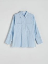 Bawełniana koszula - jasnoniebieski. Niebieskie koszule Reserved, l, bez wzorów, z bawełny, bez kołnierzyka, bez ramiączek. W wyprzedaży za 55.99 zł.