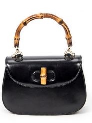 Gucci Skórzana torebka w kolorze czarnym - 21 x 15 x 7 cm rozmiar: onesize. Czarne torebki klasyczne GUCCI, bez wzorów, z materiału, przez ramię, bez dodatków. Za 7,647.99 zł.