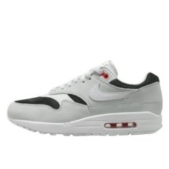 Buty do chodzenia dla dorosłych Air Max 1 Urawa (2023). Szare buty treningowe Nike, bez wzorów, z materiału, bez zapięcia, do piłki nożnej, nike air max. Za 680.20 zł.