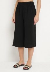 Czarne Spodnie o Długości 3/4 z Szerokimi Nogawkami Ulianisa. Czarne jeansy Born2be, l, z aplikacjami, z jeansu. Za 59.99 zł.