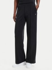 Guess Spodnie dresowe V6YB18 K4315 Czarny Regular Fit. Czarne spodnie dresowe Guess, z aplikacjami, z dresówki. Za 394.99 zł.