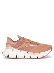 Reebok Buty do biegania Floatzig 1 100206732 Różowy. Czerwone buty do biegania Reebok, bez wzorów, z materiału, bez zapięcia, do biegania. Za 549.99 zł.