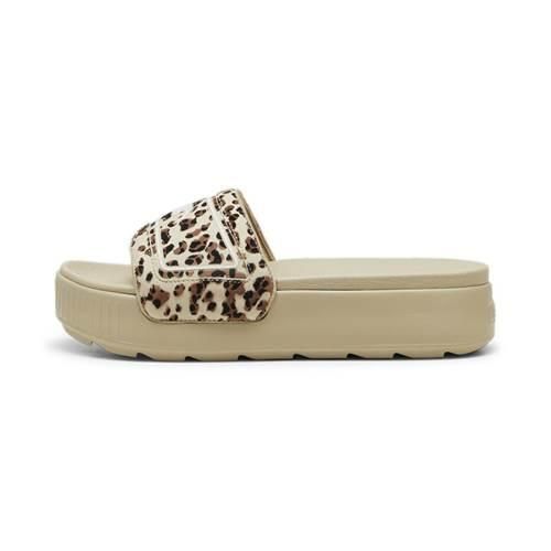 Klapki damskie Puma Karmen Slide. Brązowe klapki Puma, bez wzorów, z materiału, bez obcasa, bez zapięcia. Za 153.99 zł.