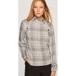 Bluzka w kratkę z raglanowym rękawem - Szary. Bluzki marki DOMYOS. W wyprzedaży za 79.99 zł.