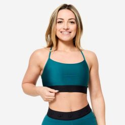 Stanik sportowy Domyos. Niebieskie biustonosze sportowe DOMYOS, bez wzorów, z elastanu, na fitness i siłownię. W wyprzedaży za 39.99 zł.