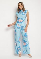 Niebieski Komplet w Kwiaty Asymetryczna Bluzka z Marszczeniem i Szerokie Spodnie Linamia. Niebieskie bluzki Born2be, m, bez wzorów, z materiału, eleganckie, z asymetrycznym kołnierzem, bez ramiączek. W wyprzedaży za 135.99 zł.