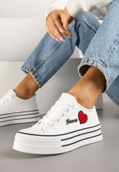 Białe Trampki na Grubej Podeszwie z Aplikacją i Napisem Eheria. Białe trampki Renee, z aplikacjami, z jeansu, klasyczne, bez zapięcia. W wyprzedaży za 67.99 zł.
