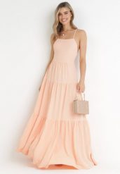 Pomarańczowa Maxi Sukienka na Cienkich Ramiączkach z Wiązaniem na Tyle Ozdobiona Falbankami Beatrics. Brązowe sukienki Born2be, m, bez wzorów, bez kołnierzyka, bez ramiączek, maxi. Za 119.99 zł.