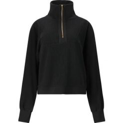 Damski sweter 1/2 zip Athlecia Reiley. Czarne swetry Athlecia, na zimę, bez wzorów, bez ramiączek. Za 288.00 zł.