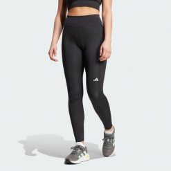 Legginsy Own the Run Winter Full Length. Czarne legginsy adidas, bez wzorów, z materiału. W wyprzedaży za 322.05 zł.