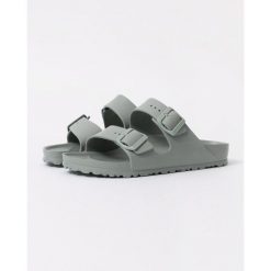 Klapki damskie Birkenstock Arizona Eva Pure Sage. Zielone klapki Birkenstock, bez wzorów, z materiału, klasyczne, bez obcasa, bez zapięcia. Za 329.99 zł.