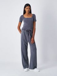 Champion Spodnie dresowe w kolorze antracytowym rozmiar: S. Czarne spodnie sportowe Champion, bez wzorów, z dresówki. Za 88.02 zł.