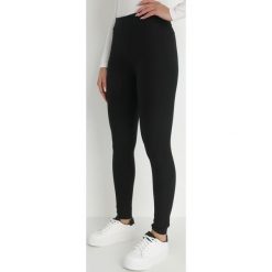 Czarne Legginsy Mirny. Czarne legginsy Born2be, bez wzorów, długie. W wyprzedaży za 79.99 zł.