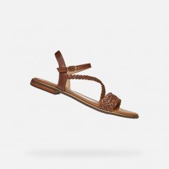 Sandały GEOX D55DQD Brązowy. Brązowe sandały Geox, bez wzorów, ze skóry, bez obcasa, bez zapięcia. Za 332.99 zł.