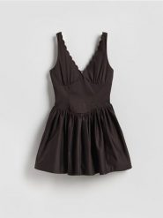 Kombinezon z bawełną - ciemnobrązowy. Brązowe kombinezony Reserved, bez wzorów, z bawełny, bez kołnierzyka, bez ramiączek. Za 159.99 zł.