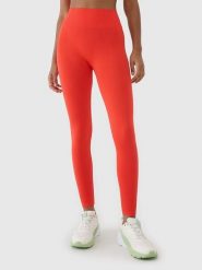 4F Legginsy funkcyjne w kolorze pomarańczowym rozmiar: XS/S. Pomarańczowe legginsy 4f, bez wzorów, z materiału, sportowe, długie. Za 47.94 zł.