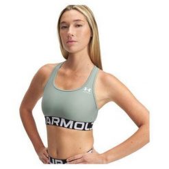 Stanik sportowy Under Armour HeatGear Authentics Mid Branded Bra. Zielone biustonosze sportowe Under Armour, bez wzorów, na fitness i siłownię. Za 102.99 zł.