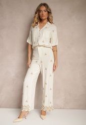 Biało-Beżowe Spodnie z Wiskozą i Lnem High Waist o Szerokim Kroju z Haftami Olerina. Białe jeansy Renee, na lato, l, bez wzorów, z jeansu, boho, z podwyższonym stanem. W wyprzedaży za 74.99 zł.