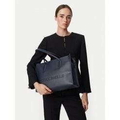 Torebka Coccinelle. Niebieskie shopper bag Coccinelle, bez wzorów, bez dodatków. Za 1,449.00 zł.