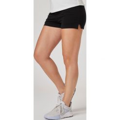 Spodenki fitness damskie Nyamba 520 slim. Niebieskie szorty sportowe DOMYOS, bez wzorów, z bawełny, na fitness i siłownię. W wyprzedaży za 39.99 zł.