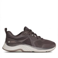 Buty na siłownię Under Armour. Brązowe buty treningowe Under Armour, bez wzorów, bez zapięcia, na fitness i siłownię. Za 459.99 zł.