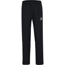 Damskie spodnie dresowe Hummel Core 2.0 Woven. Białe spodnie sportowe Hummel, bez wzorów, z dresówki, na fitness i siłownię. Za 230.00 zł.