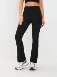 Legginsy flare GYM HARD - czarny. Czarne legginsy Sinsay, bez wzorów. Za 49.99 zł.