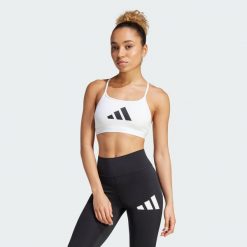 Biustonosz Aeroreact Graphic. Czarne biustonosze sportowe adidas, bez wzorów, z materiału, na jogę i pilates. Za 129.00 zł.