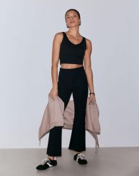 Damskie legginsy z mieszanki modalu, rozszerzane, wysoki stan Luxe czarne. Czarne legginsy AIM'N, bez wzorów, z elastanu. Za 423.00 zł.