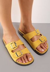 Żółte Klapki Kleogoria. Żółte klapki Born2be, bez wzorów, eleganckie, bez obcasa, na płaskiej podeszwie, bez zapięcia. Za 59.99 zł.
