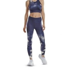 Długie legginsy sportowe do biegania CEP limitowana kolekcja Bloom damskie. Białe legginsy CEP, bez wzorów, sportowe, długie. Za 349.00 zł.