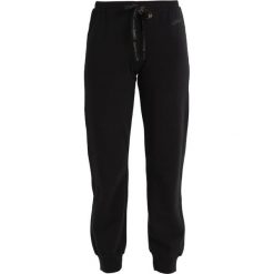 Dimensione Danza POLSO FELPA Spodnie treningowe black. Spodnie dresowe marki Dimensione Danza. W wyprzedaży za 149.50 zł.