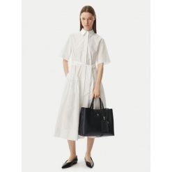 Torebka Tommy Hilfiger. Czarne torebki klasyczne Tommy Hilfiger, bez wzorów, klasyczne, bez dodatków. Za 699.99 zł.