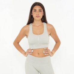 Crop top sportowy ICONIC. Szare biustonosze sportowe LEGEA, bez wzorów, z elastanu, na fitness i siłownię. W wyprzedaży za 72.00 zł.