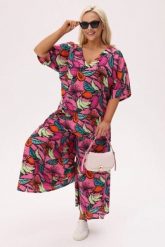Wakacyjny różowy komplet Tropica Owocowa Fiesta (bluzka + spódnico - spodnie) PLUS SIZE XXL OVERSIZE. Czerwone bluzki Moda Size Plus Iwanek, l, bez wzorów, z bawełny, eleganckie, bez kołnierzyka, plus size, bez ramiączek. Za 379.90 zł.