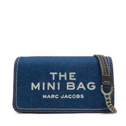 Torebka Marc Jacobs. Niebieskie kopertówki Marc Jacobs, bez wzorów, z denimu, wizytowe, bez dodatków. Za 769.99 zł.