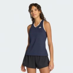 Top Tennis Classics. Niebieskie topy adidas, bez wzorów, sportowe, bez kołnierzyka, bez ramiączek. Za 219.00 zł.