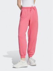 Adidas Spodnie dresowe ALL SZN Fleece IM0334 Różowy Loose Fit. Czerwone spodnie dresowe adidas, bez wzorów, z bawełny. Za 299.99 zł.
