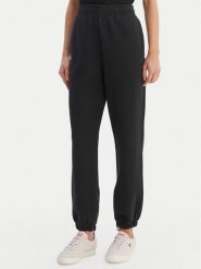 Lacoste Spodnie dresowe XF5244 Granatowy Regular Fit. Niebieskie spodnie dresowe Lacoste, bez wzorów, z dresówki. Za 639.99 zł.