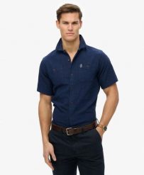 Superdry Koszula krótki rękaw The Merchant Store o fakturze. Niebieskie koszule Superdry, l, bez wzorów, z bawełny, vintage, bez kołnierzyka, bez ramiączek. Za 344.20 zł.