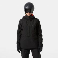 Damska kurtka narciarska Helly Hansen Powchaser Anorak. Czarne kurtki narciarskie Helly Hansen, na zimę, bez wzorów, bez kaptura, narciarskie. Za 1,084.00 zł.