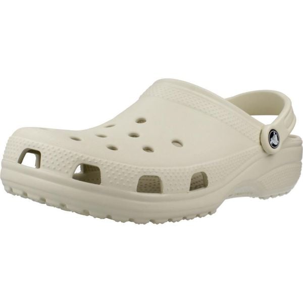 Klapki dla dorosłych Crocs Classic. Brązowe klapki Crocs, bez wzorów, z materiału, sportowe, bez obcasa, bez zapięcia. Za 202.85 zł.