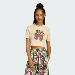 KOSZULKA ADIDAS x FARM RIO GRAPHIC T-SHIRT CROPPED. Białe t-shirty adidas, bez wzorów, casualowe, bez kołnierzyka, bez ramiączek. Za 149.00 zł.