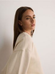 Bluza oversize - jasnożółty. Żółte bluzy Reserved, l, bez wzorów, z bawełny, bez ramiączek, bez kaptura. W wyprzedaży za 49.99 zł.