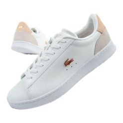 Buty Lacoste Carnaby trampki damskie białe 748SFA00161Y9. Białe trampki bez wzorów, ze skóry, sportowe, bez zapięcia. Za 684.21 zł.