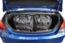 Torby Do Bagażnika Bmw 6 Cabrio 2011-2018 4Szt Kjust. Czarne torby podróżne KJUST, bez wzorów, z kauczuku. Za 964.00 zł.