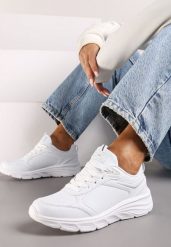 Białe Klasyczne Płaskie Buty Sportowe Sneakersy z Tłoczoną Podeszwą Velandria. Białe buty sportowe lifestyle Born2be, bez wzorów, z bawełny, bez zapięcia. Za 119.99 zł.